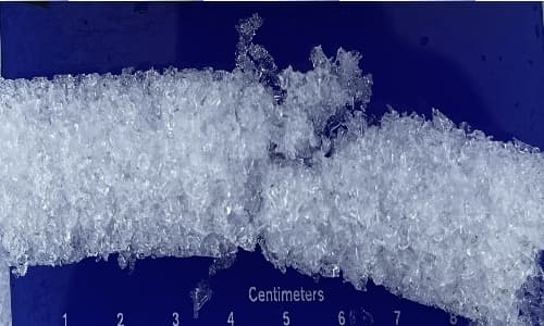 Dataset sample: snow core cross-section laid on a centimeter-ruled crystal card