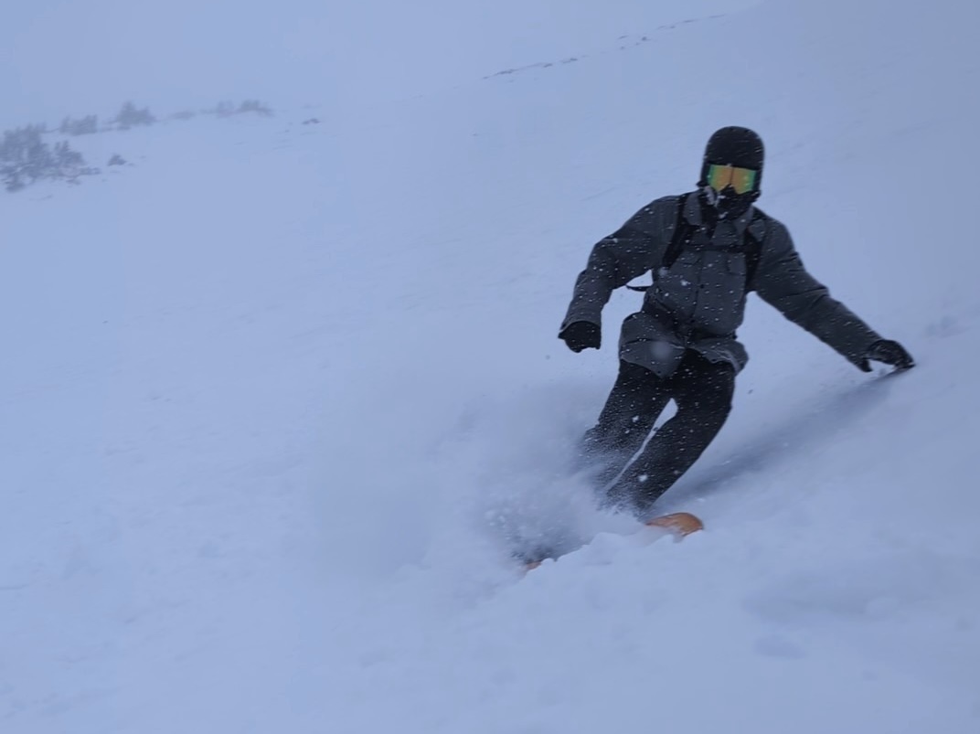 Denny Schaedig shredding snow